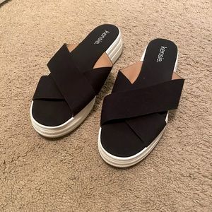 Black and white platform flip flops